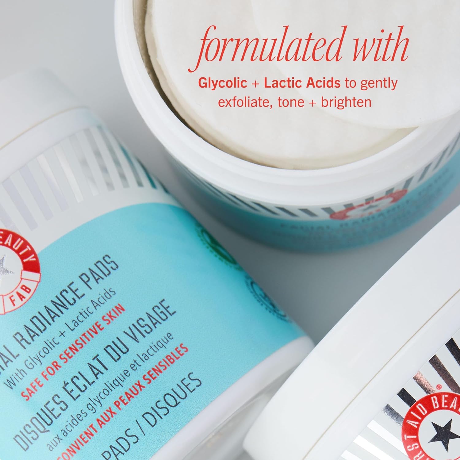 First Aid Beauty - Facial Radiance Pads with Glycolic & Lactic Acids Daily Exfoliating Pads with AHA Visibly Smaller Pores Help Tone & Brighten Skin One-Step Makeup Prep Compostable 60 2ct
